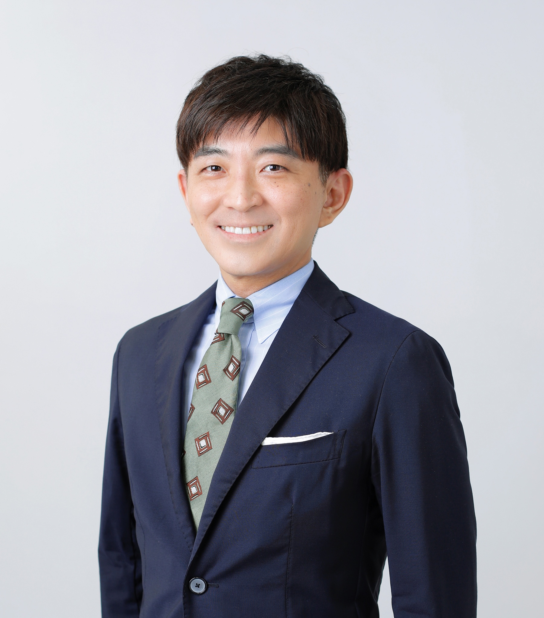 在間　亮